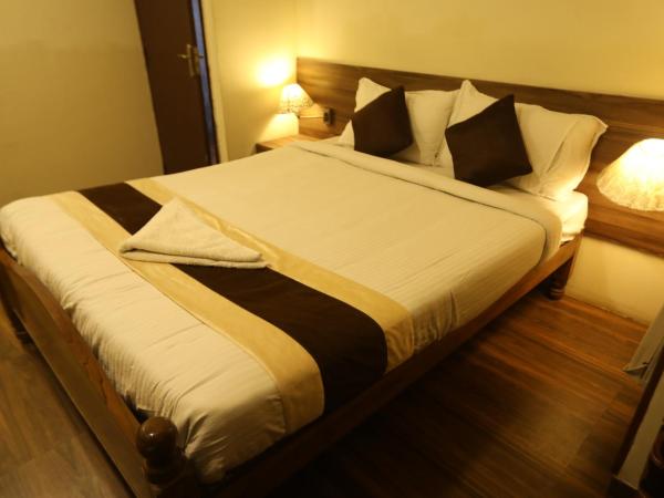 Nestlay Rooms Ambattur : photo 7 de la chambre chambre deluxe