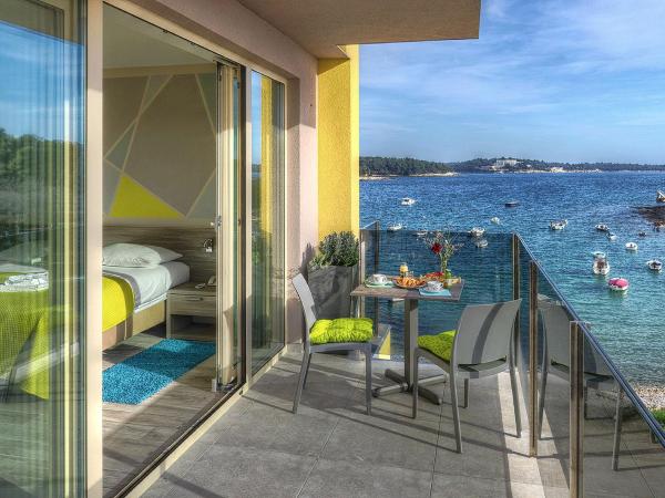 Hotel Modo : photo 6 de la chambre chambre triple supérieure - vue sur mer