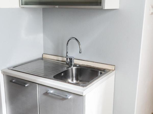 Residence Le Cure : photo 10 de la chambre appartement avec salle de bains commune et terrasse