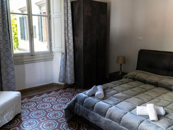 Residence Le Cure : photo 5 de la chambre chambre quadruple avec salle de bains commune et balcon