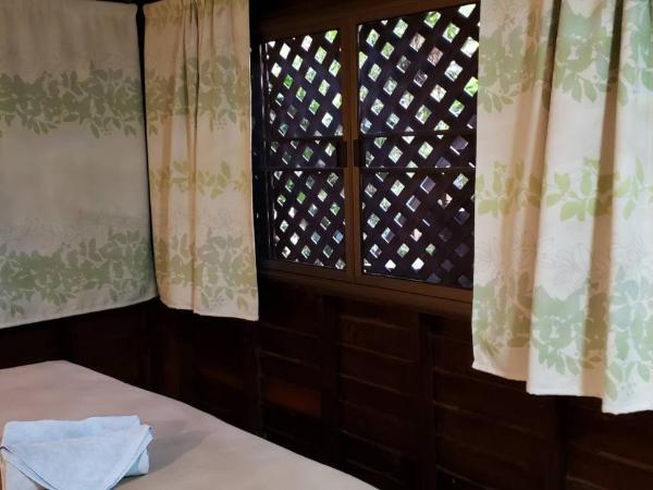 Siriwan Hostel : photo 5 de la chambre chambre familiale deluxe