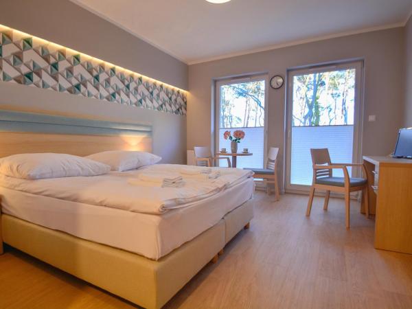 Apartamenty Cesarskie - Apartamenty Bryza - Parking : photo 1 de la chambre appartement standard