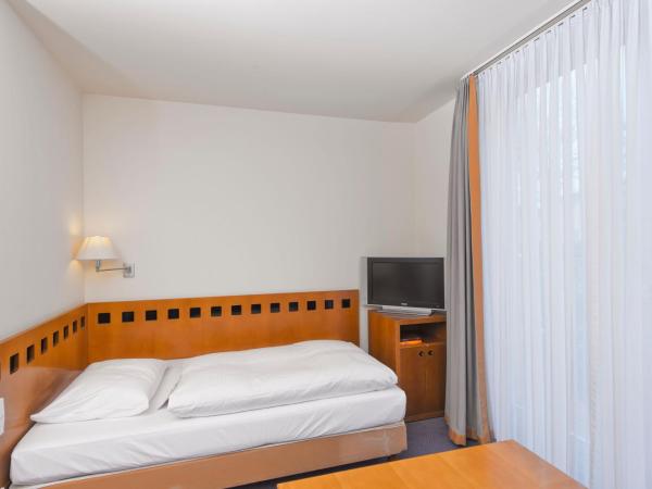 Radisson Blu Park Hotel & Conference Centre : photo 1 de la chambre single studio (villenpark)