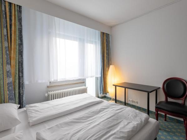 Hotel Königshof The Arthouse : photo 6 de la chambre appartement avec terrasse