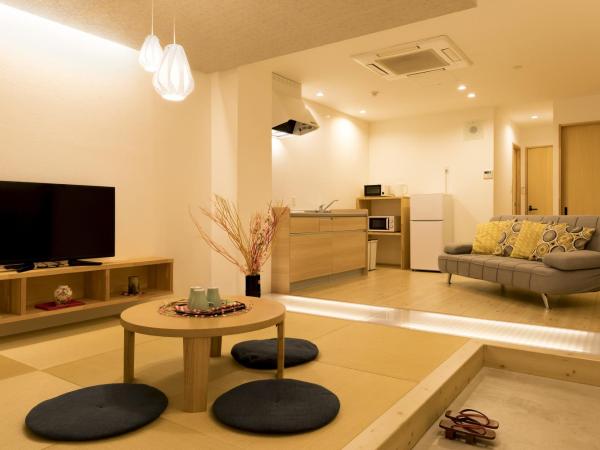 Guesthouse Raku : photo 1 de la chambre chambre familiale standard