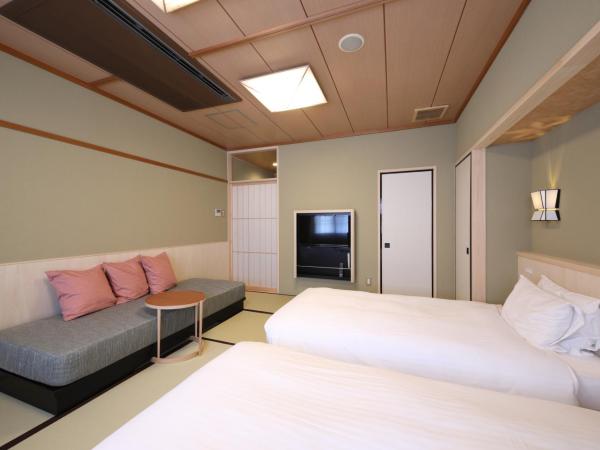 Gion Ryokan Karaku : photo 5 de la chambre chambre lits jumeaux avec tatami