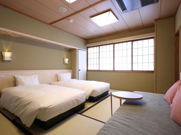 Gion Ryokan Karaku : photo 4 de la chambre chambre lits jumeaux avec tatami