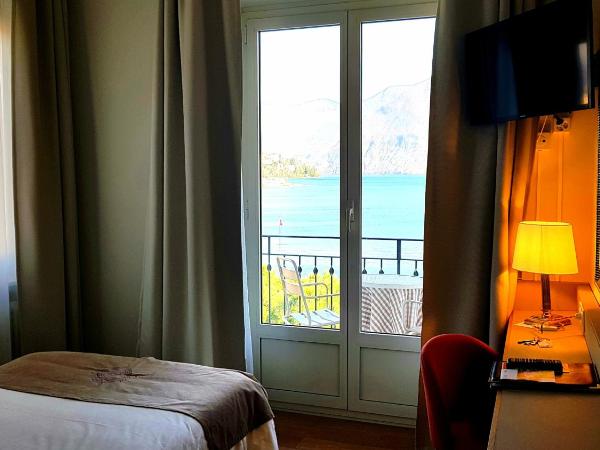 Hotel Walter Au Lac : photo 1 de la chambre hébergement 2 chambres simples communicantes avec balcon - vue sur lac