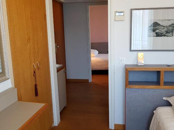 Hotel Walter Au Lac : photo 2 de la chambre hébergement 2 chambres simples communicantes avec balcon - vue sur lac