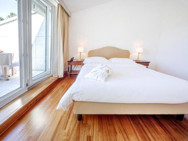 Villa Sassa Hotel, Residence & SPA : photo 5 de la chambre suite penthouse - vue sur lac