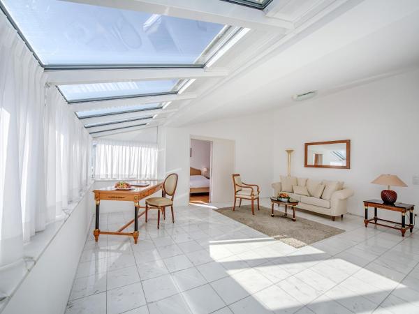 Villa Sassa Hotel, Residence & SPA : photo 4 de la chambre suite penthouse - vue sur lac