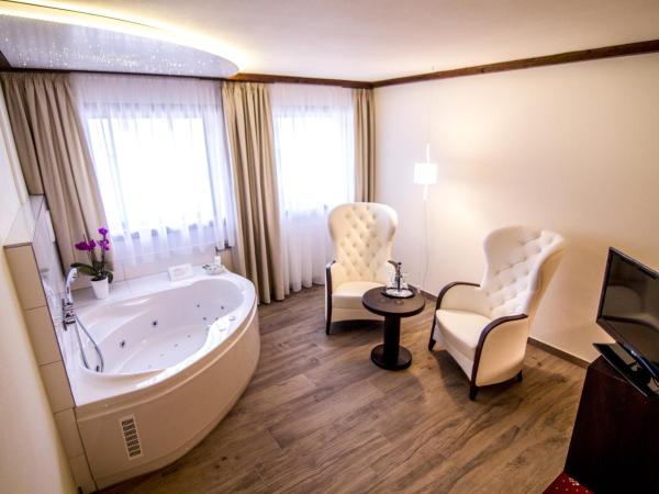 Zur Weinsteige : photo 4 de la chambre suite junior avec bain à remous - bâtiment principal