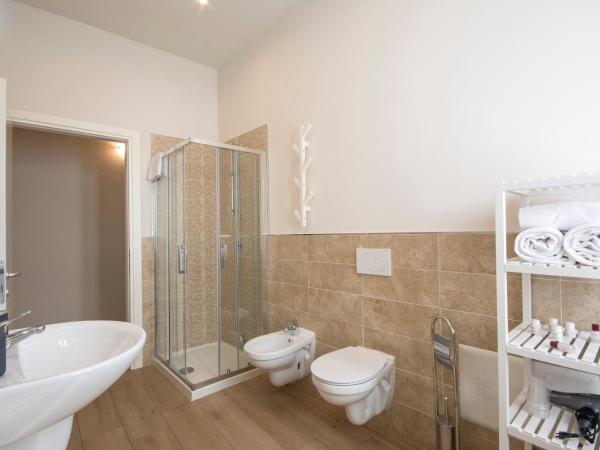 Piazza Paradiso Accommodation : photo 7 de la chambre appartement - vue sur jardin - bâtiment séparé