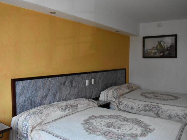 Hotel Baluarte : photo 3 de la chambre chambre double avec 2 lits doubles