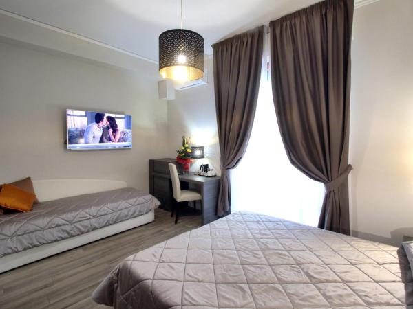 Alderotti Home : photo 6 de la chambre chambre familiale avec salle de bains privative