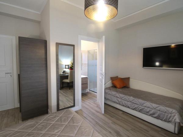 Alderotti Home : photo 4 de la chambre chambre familiale avec salle de bains privative