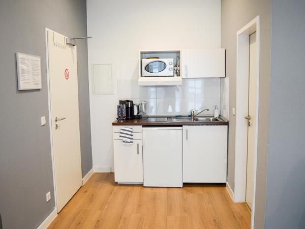 Centerapartments Tonhallenstraße : photo 6 de la chambre appartement t23