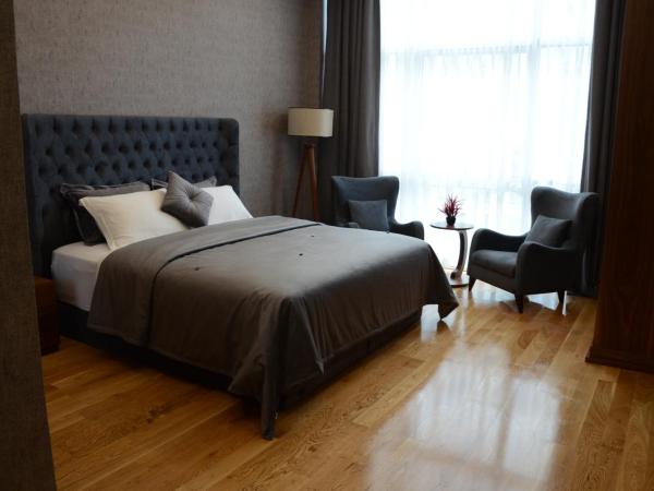 Teknosports Otel : photo 6 de la chambre chambre lit king-size