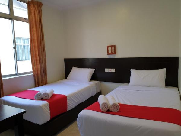 Fully Hotel Desa Tebrau : photo 1 de la chambre chambre lits jumeaux standard