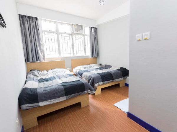 Check Inn HK : photo 2 de la chambre chambre familiale Économique