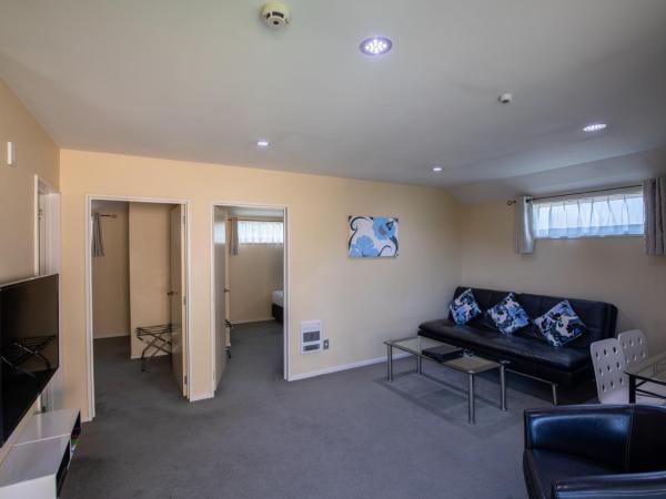 ASURE Abbella Lodge Motel : photo 7 de la chambre appartement 2 chambres avec baignoire spa