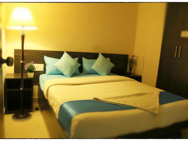 Orange Corner, Near Kempegowda Bangalore international airport : photo 6 de la chambre suite familiale deluxe