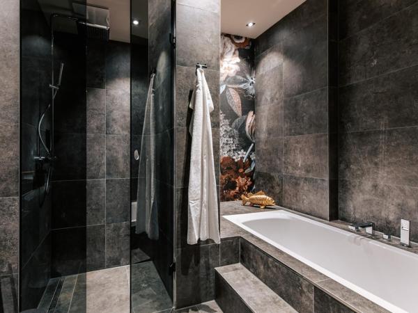 Aiola Living Graz : photo 2 de la chambre chambre double deluxe avec baignoire