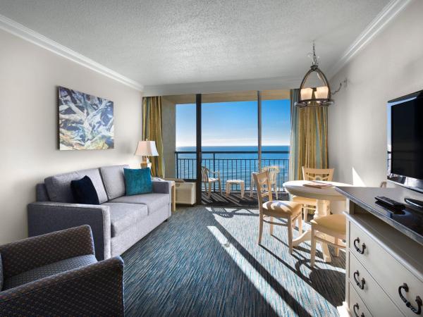 Coral Beach Resort : photo 1 de la chambre suite familiale côté océan - 2 lits queen-size et 1 lit double escamotable