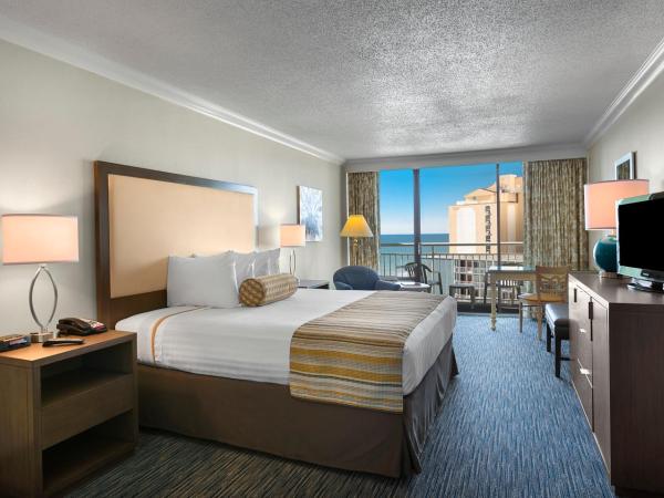 Coral Beach Resort : photo 1 de la chambre chambre lit king-size - vue sur océan