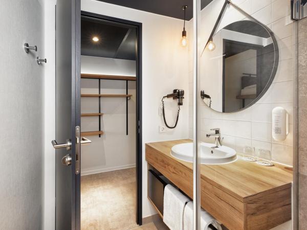 H2 Hotel München Olympiapark : photo 6 de la chambre chambre double ou lits jumeaux