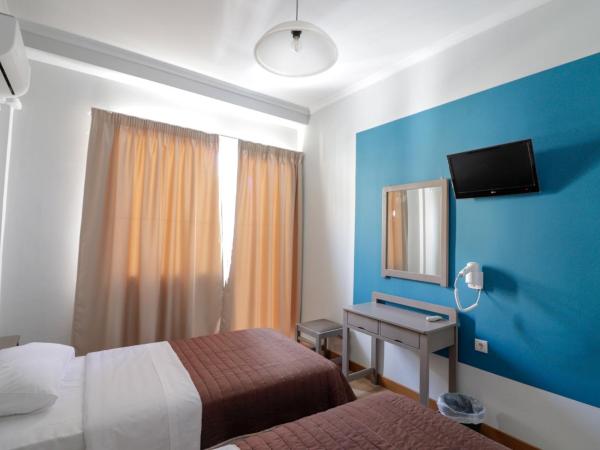 Athens Hawks : photo 2 de la chambre chambre lits jumeaux avec salle de bains