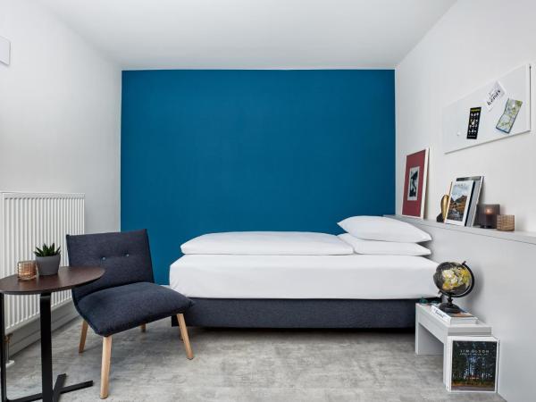 H.ome Serviced Apartments München : photo 5 de la chambre appartement supérieur