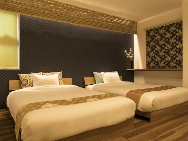 Guesthouse Raku : photo 10 de la chambre chambre familiale standard