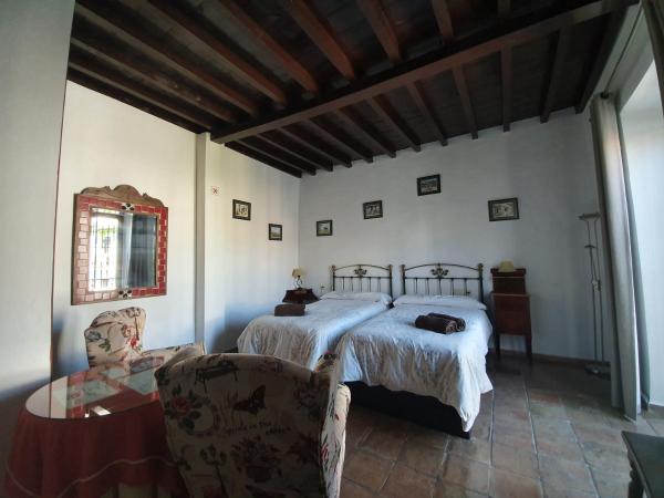 Casa del Aljarife : photo 1 de la chambre chambre lits jumeaux avec balcon