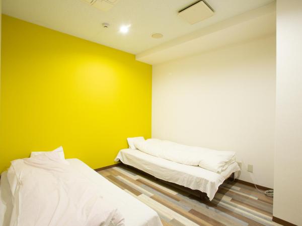 123 Guesthouse : photo 3 de la chambre twin room with shared bathroom - f