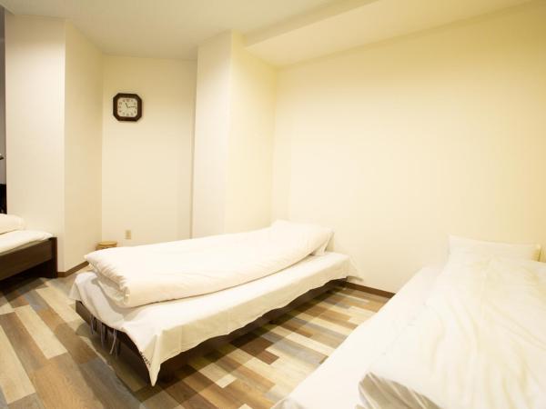 123 Guesthouse : photo 8 de la chambre chambre triple - vue sur ville