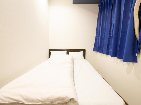 123 Guesthouse : photo 4 de la chambre double room with small double bed and shared bathroom - l