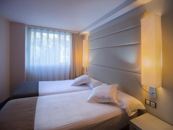 Yomo Mola Park : photo 5 de la chambre chambre lits jumeaux