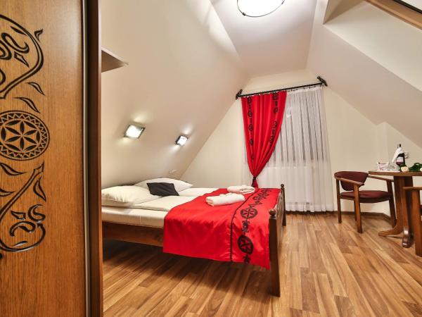 Grand Podhale Resort&Spa- Jacuzzi - Sauna fińska i Łaźnia parowa - Widok na Tatry : photo 5 de la chambre chambre double deluxe avec baignoire