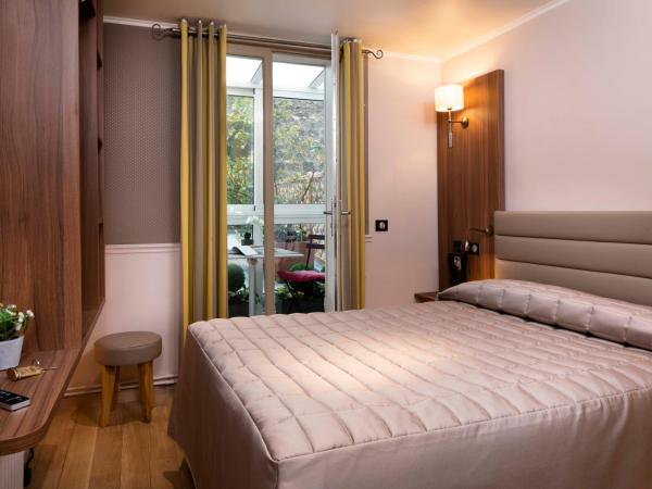 Hôtel de la Tour Eiffel : photo 3 de la chambre chambre quadruple avec terrasse