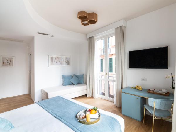 Hotel Aristeo : photo 3 de la chambre chambre triple supérieure