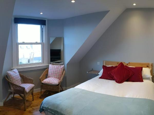 Falcon Crest Guest House : photo 1 de la chambre chambre double deluxe avec baignoire