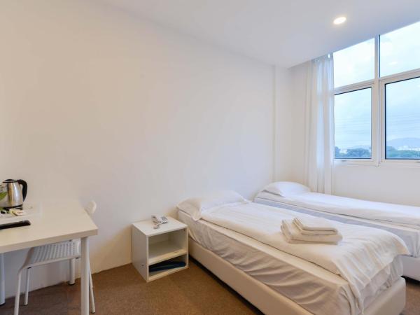 Fumah Hotel Jalan Kuching : photo 2 de la chambre chambre lits jumeaux standard