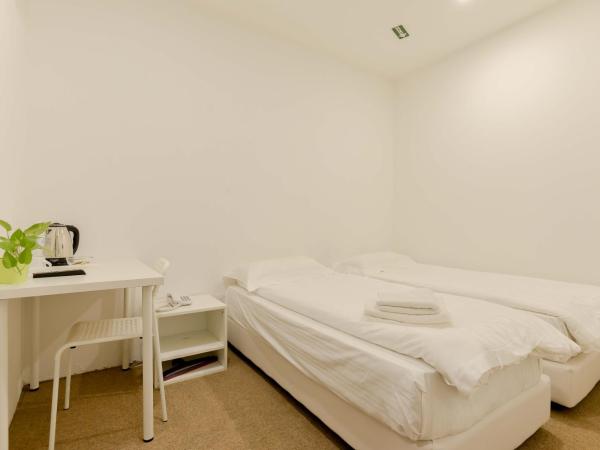 Fumah Hotel Jalan Kuching : photo 3 de la chambre chambre lits jumeaux standard