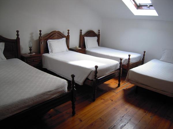 Guesthouse Lusa Atenas : photo 1 de la chambre chambre quadruple