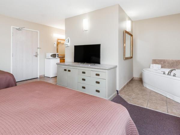 London Travel Inn : photo 3 de la chambre suite avec baignoire spa