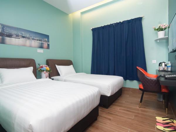 GOOD 9 HOTEL - Bukit Dahlia : photo 3 de la chambre chambre lits jumeaux deluxe