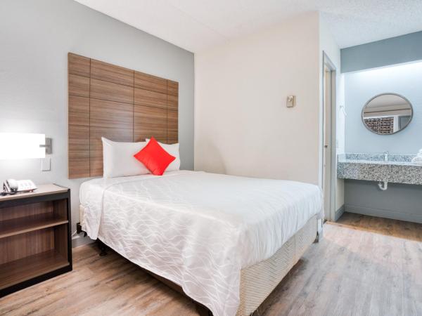 Dallas Love Field Inn : photo 1 de la chambre chambre lit king-size