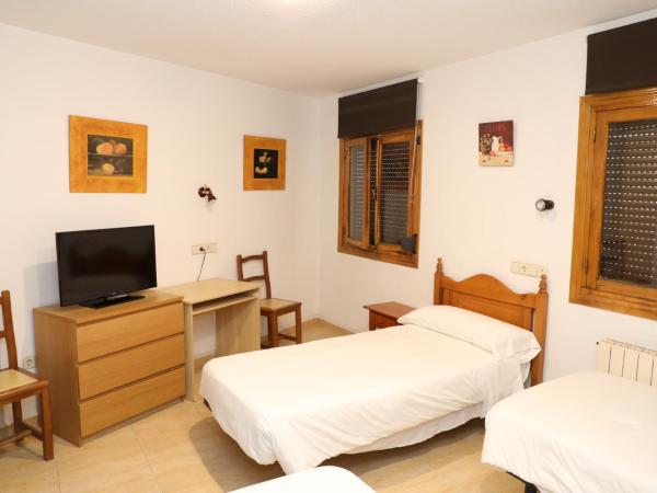 Hostal El Descanso : photo 6 de la chambre chambre triple