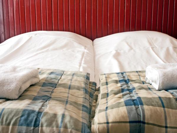 De Mallemoolen : photo 1 de la chambre chambre quadruple standard avec salle de bains commune